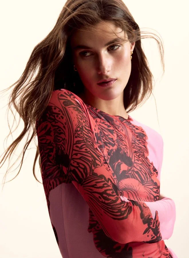 ديسيجوال قميص صممه السيد كريستيان لاكروا